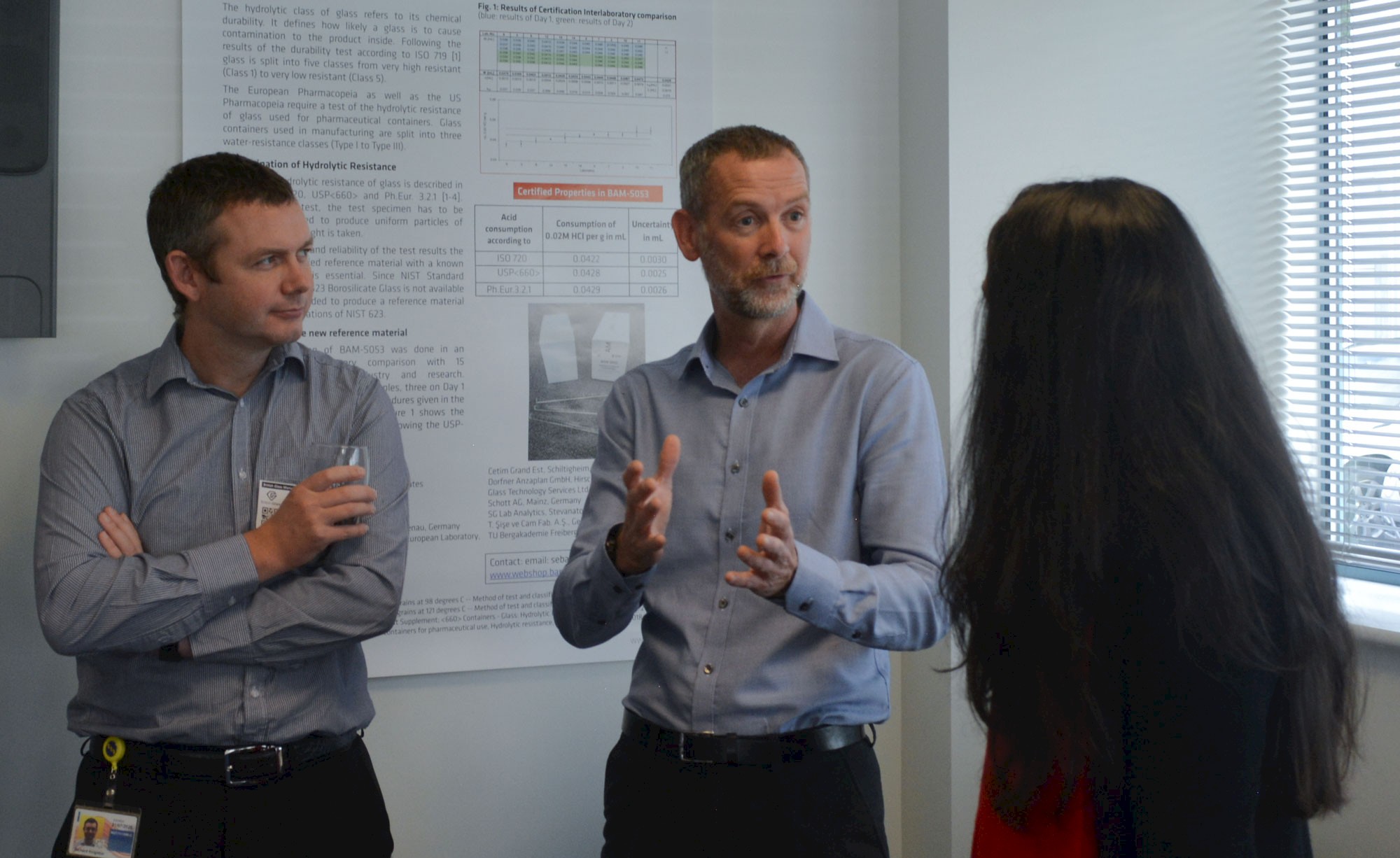 group having a glass consultancy discussion