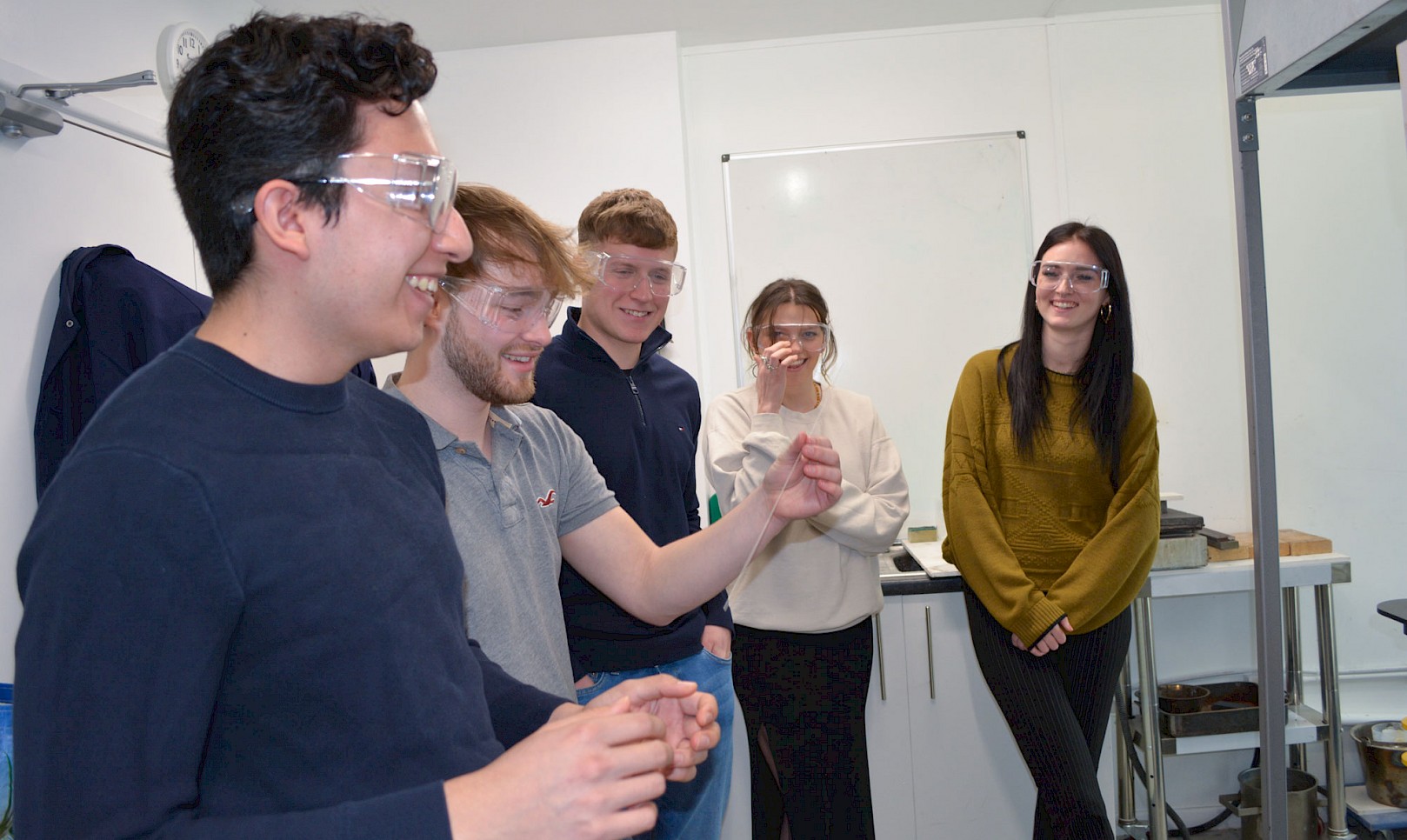 Student in engineering advancements in glass manufacturing lecture
